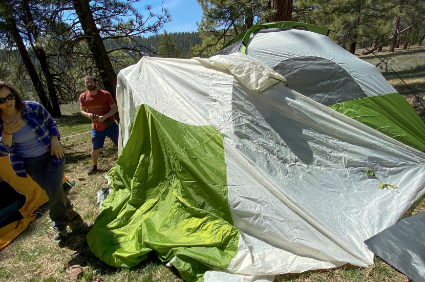 coleman evanston screened 6 - the look of frustration and defeat as we struggle to get the rainfly...