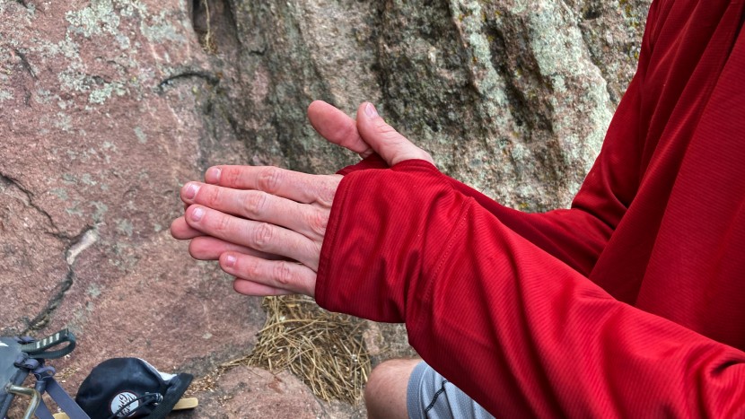 montbell cool hoodie - thumb holes help secure the sleeves to the end of the wrist and help...