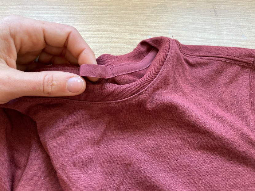 brooks distance for women - a soft hang tab is incorporated into the neckline, making it easy to...