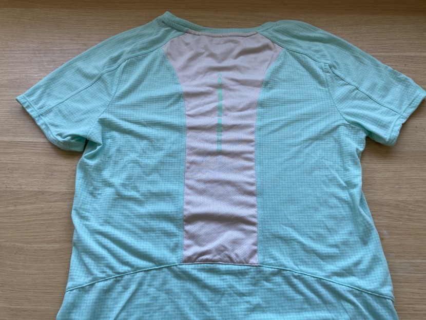 nathan rise short sleeve for women - lots of additional panels and seaming on the back of this shirt are...