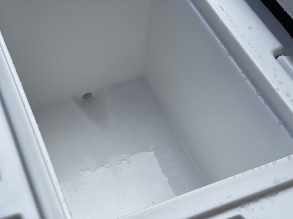 cooler - even just a small drainage channel allows the opening to be below...