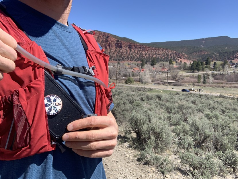 hydration pack for running men - having quick access to your phone to snap a photo or consult a map...