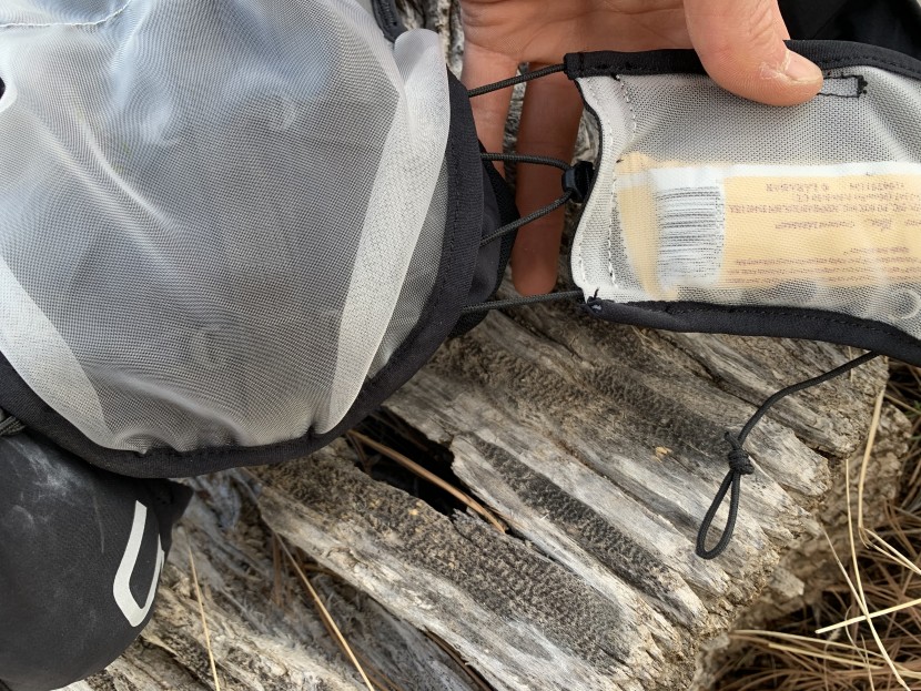 hydration pack for running men - this cinch system uses four zig-zags of static cord for a more...