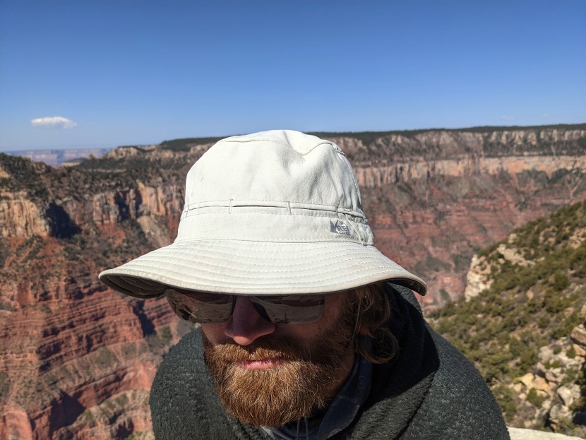 sun hat - the bucket hat&#039;s beige color doesn&#039;t attract sunlight, but it does...