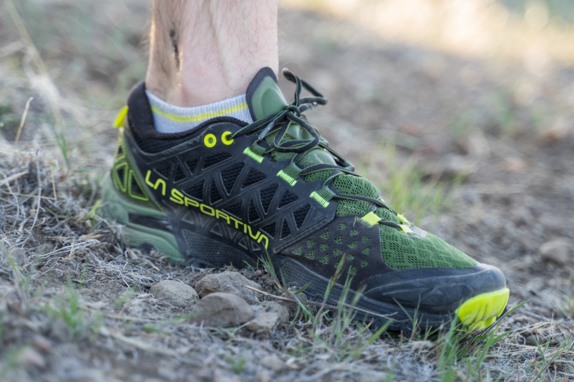 la sportiva bushido ii - a padded tongue and tpu overlay for increased structure protects the...