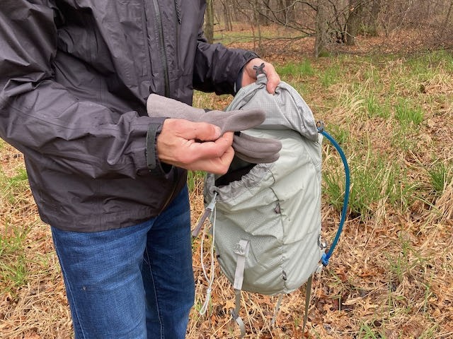 the drawstring-style opening of the main compartment makes it easy...