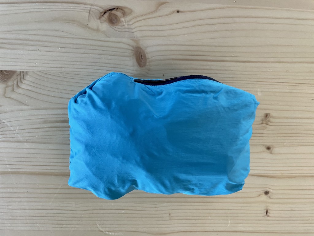 running jacket womens - this jacket packs down into a tiny ball for easy travel.