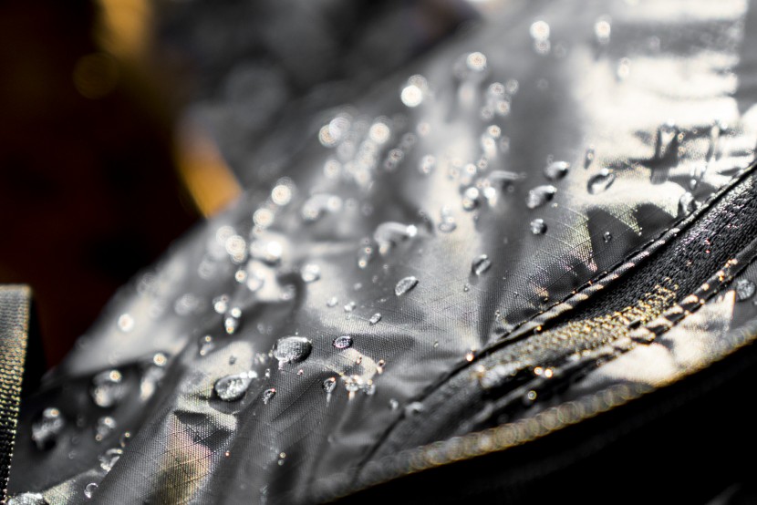 rei stuff travel duffel - though its nylon fabric is slightly repellent to water, we would not...