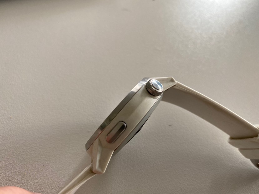 coros apex - it features a simple push dial and a small flat button that acts as...