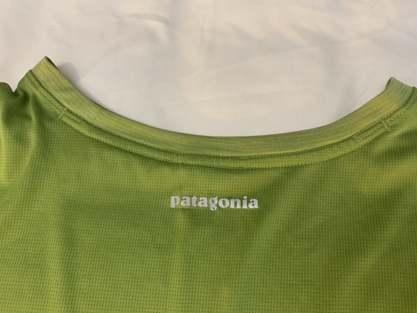 running shirt - despite the reflective logo on the front and back of the shirt, the...