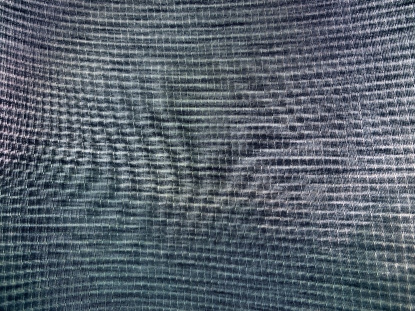 the fabric throughout most of the shirt is a relatively see through...