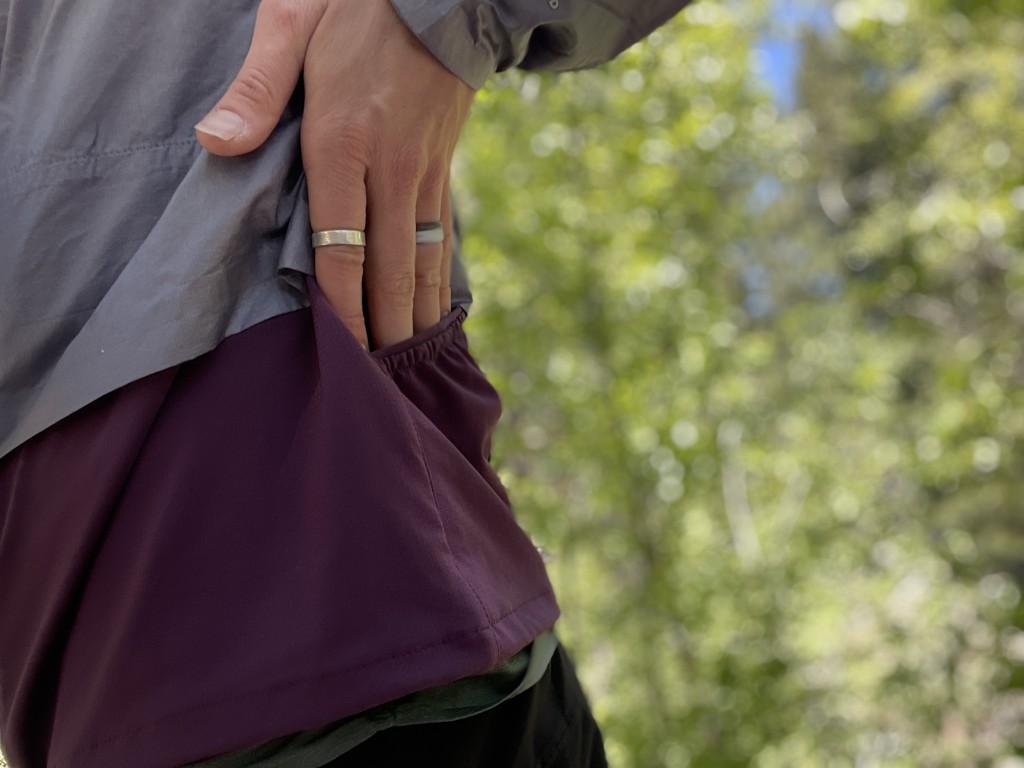 outdoor research helium wind hoody for women - two elastic pockets proved very useful and larger than we thought.