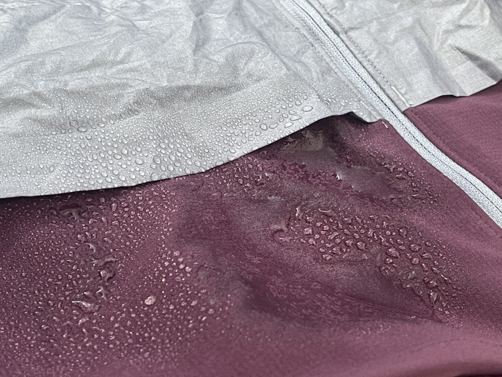 outdoor research helium wind hoody for women - the top portion is great in the rain. the bottom gets soaked almost...