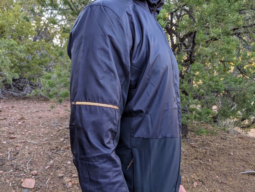 salomon agile full-zip hoodie - a highly reflective insert in the arm of the salomon agile improves...