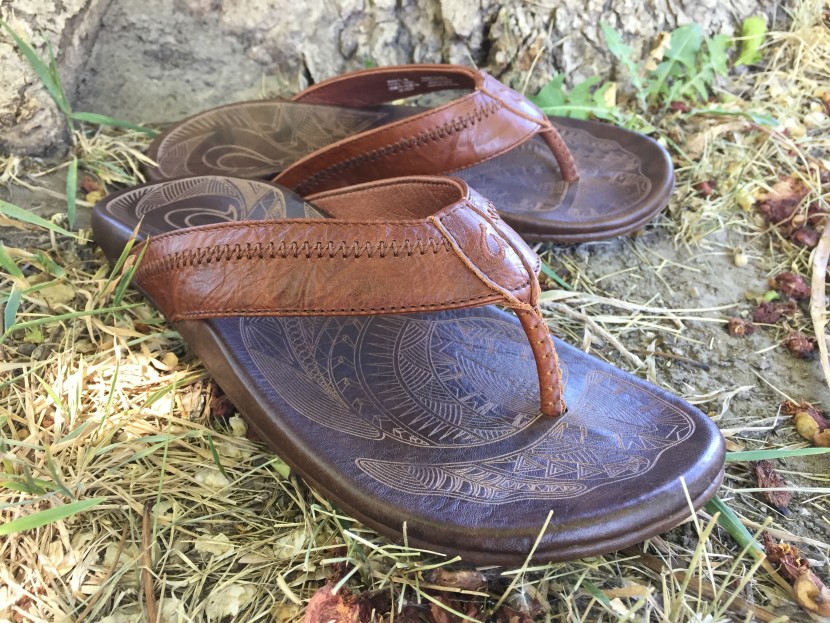 olukai hiapo - laser-etched footbed, tight leather stitching, and smooth clean...