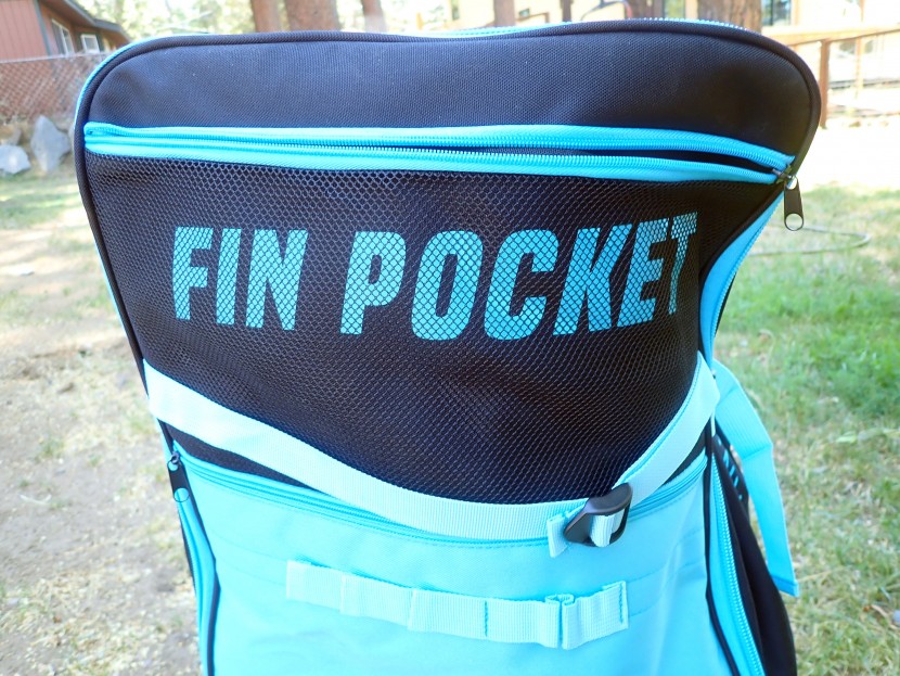 the gili komodo features a "fin pocket" as well as additional mesh...