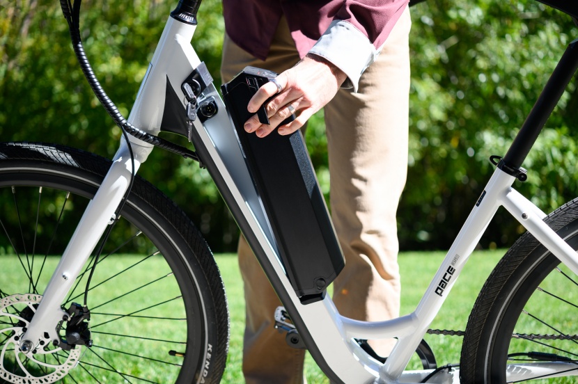 aventon pace 350 step-through - the battery slots into a large cutout in the frame and is easy to...