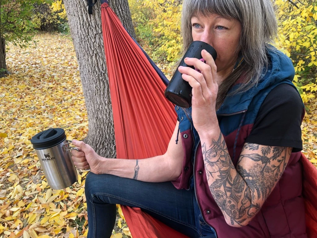 stanley adventure all-in-one camping coffee review - our lead reviewer enjoying a cup of surprisingly yummy coffee. if...