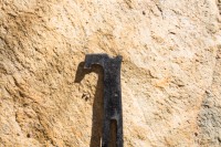 The hooked head is key for hooking cam triggers or prying at the cam...