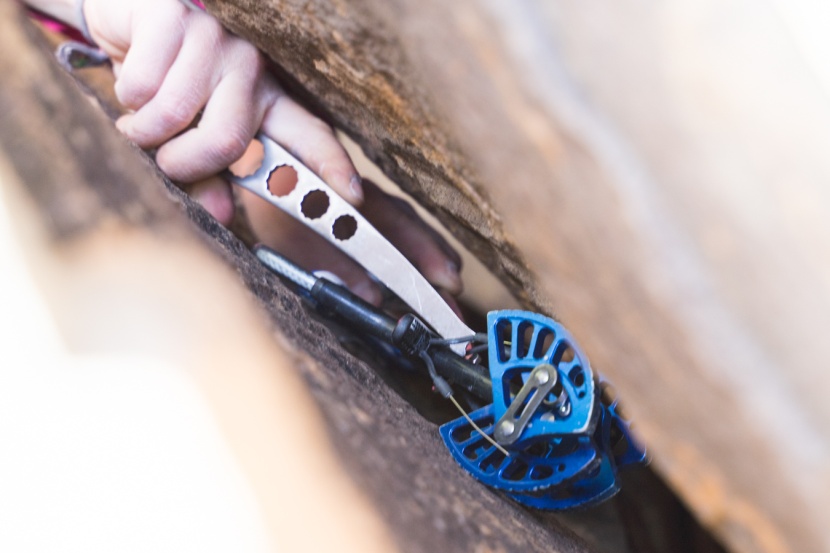 nut tool - fishing out a cam with the torque&#039;s hooked head.