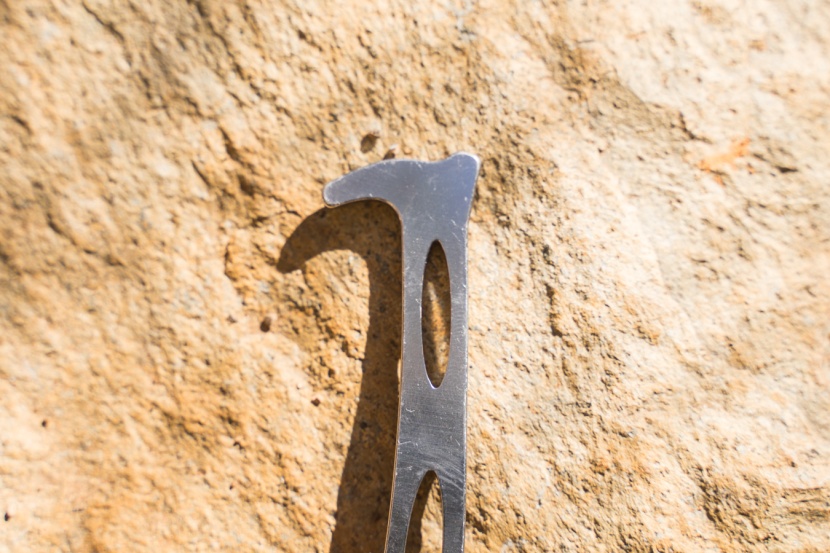 nut tool - a curved head can hook cam triggers and lobes or even fish out...