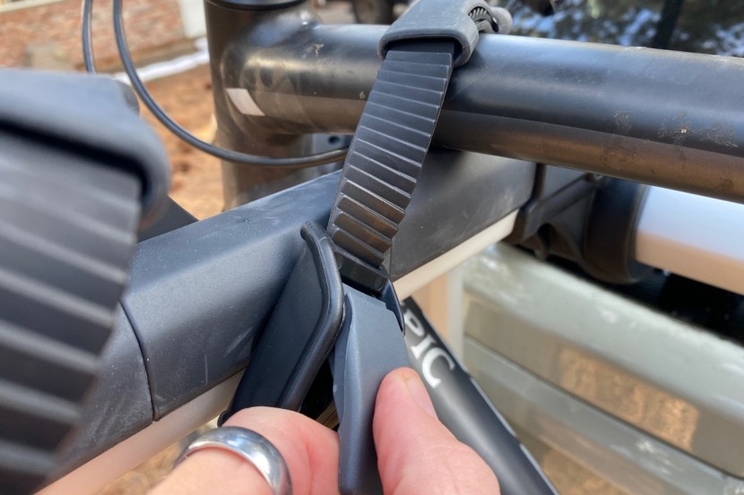 the ratcheting straps secure the bikes on the rack. this system is...