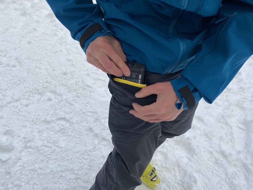 the right thigh pocket has an internal padded transceiver pocket...