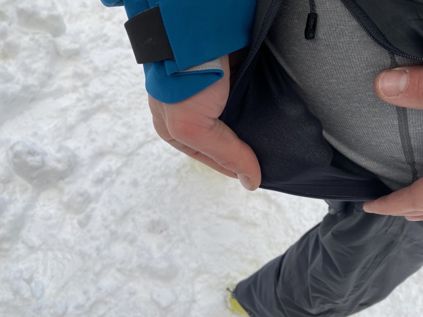 black diamond dawn patrol hybrid - the thin softshell material is porous and not warm.