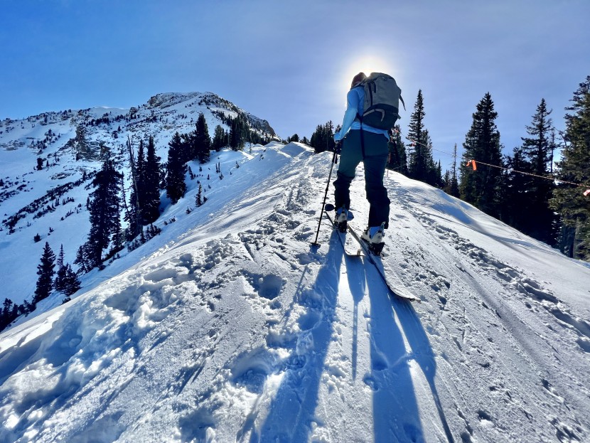 outdoor research skyward ii ascentshell for women - touring uphill in the skyward ii pants.