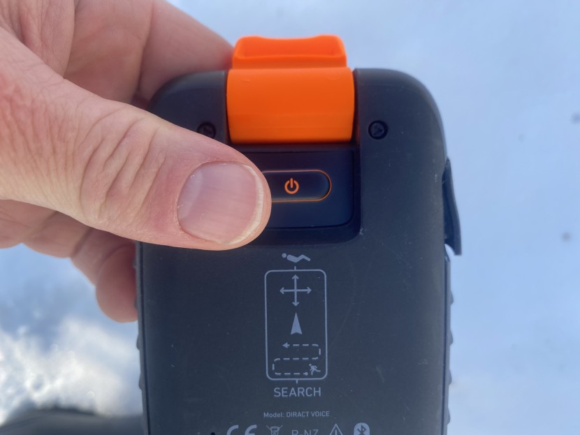 ortovox diract voice - showing the location of the power-up switch under the search lever...