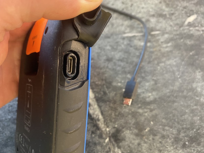 ortovox diract voice - the covered micro-usb port is where you can recharge and plug in to...