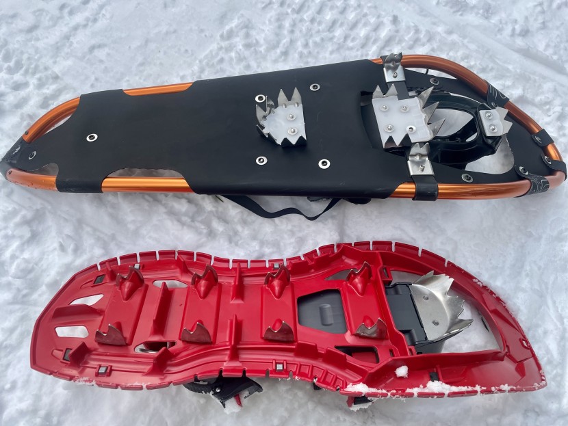 snowshoes - the upper pair has basic traction placed only under the foot, while...