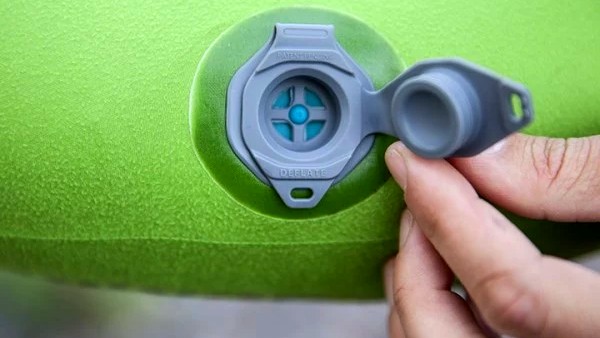 simply open the top valve to inflate. a rubber stopper prevents air...