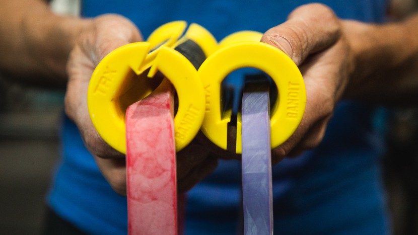 exercise resistance bands - the trx bandit handles easily fit most pull-up bands. here we have...