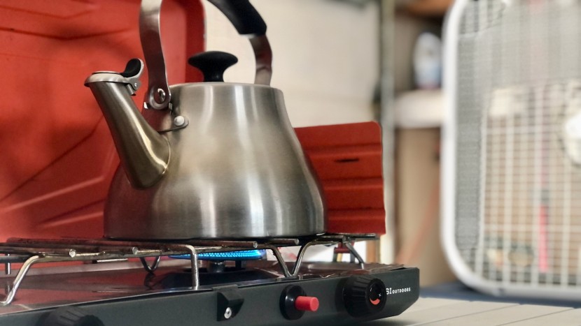 camping stove - to evaluate wind resistance, we use a box fan to simulate wind, and...