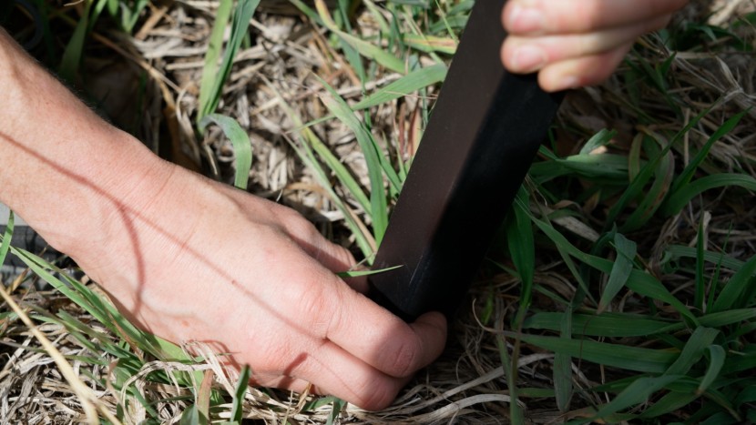 here our reviewer is adjusting the height of one of the legs. each...