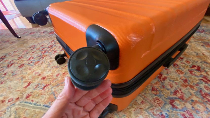 amazon basics 30&quot; hardside spinner - close-up of the large two-wheel spinners on the amazon basics...