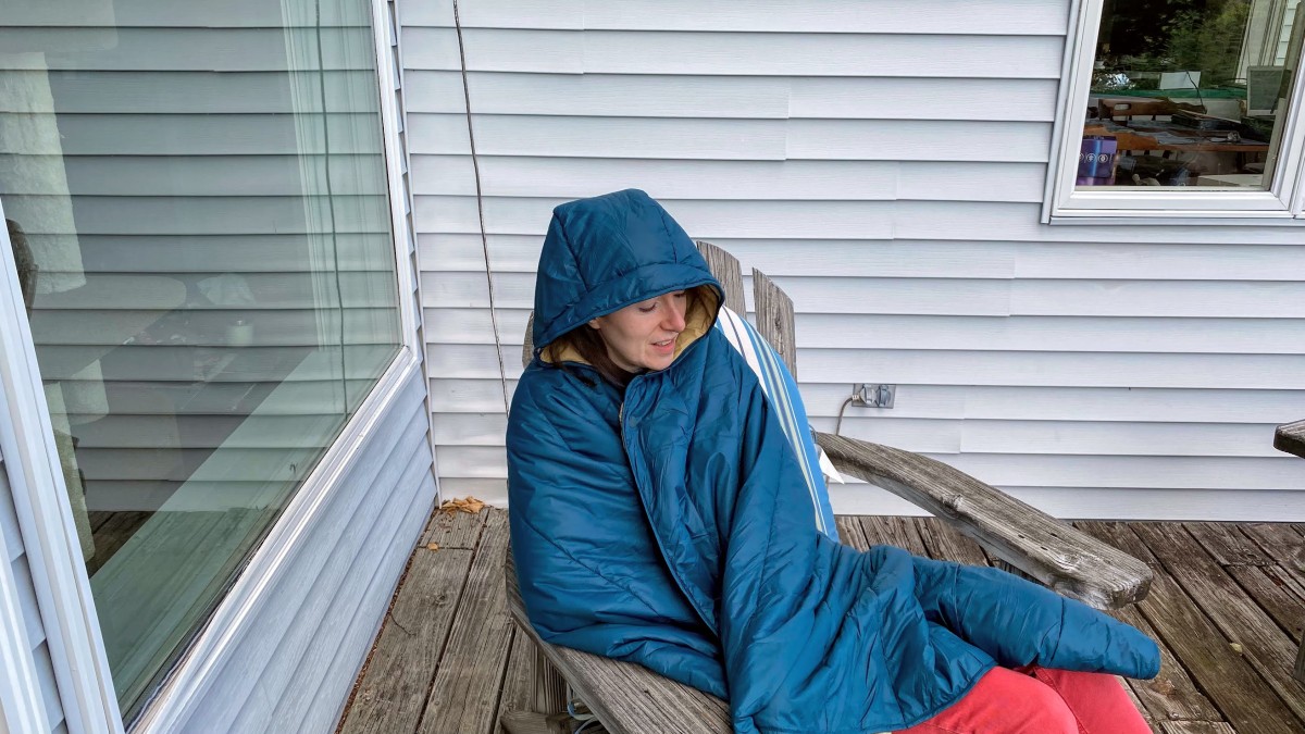 REI Co-Op Camp Wrap Review (This blanket doubles as a cape with a hood that adds another dimension of warmth.)