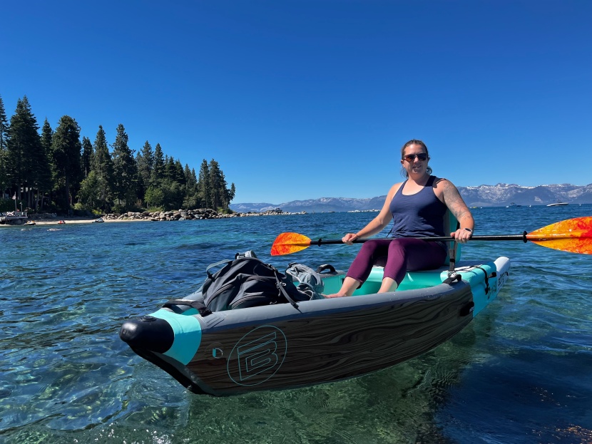 inflatable kayak - sitting this high above the water requires a longer paddle but also...