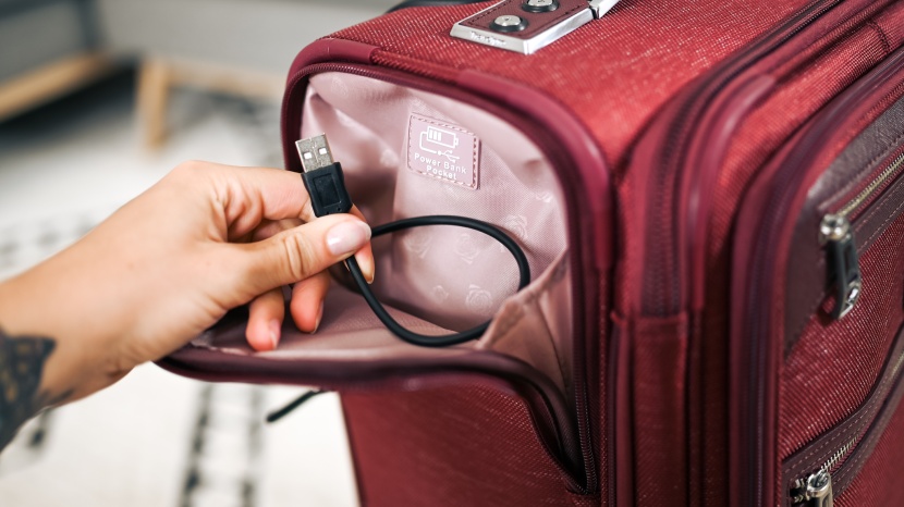 the powerpocket tucked away into the side of this carry-on is a...