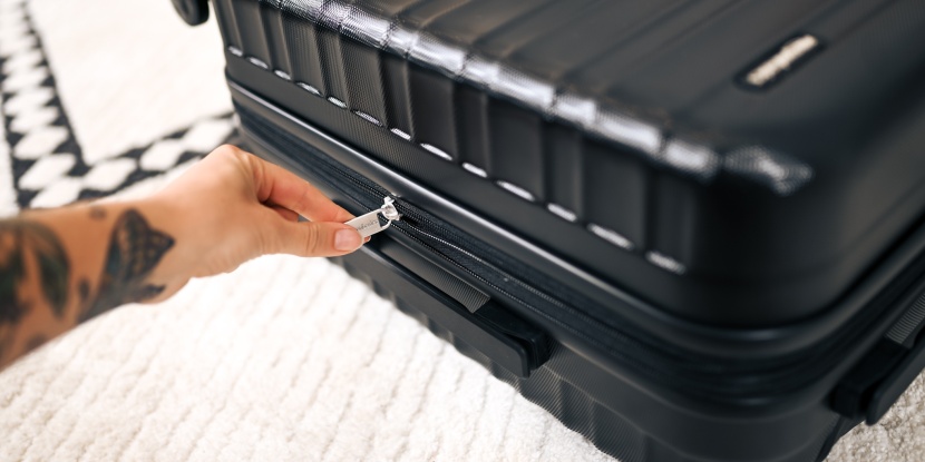 amazon basics 20-inch hardside spinner - the amazon basic has smooth zippers, but it lacks the ability to be...