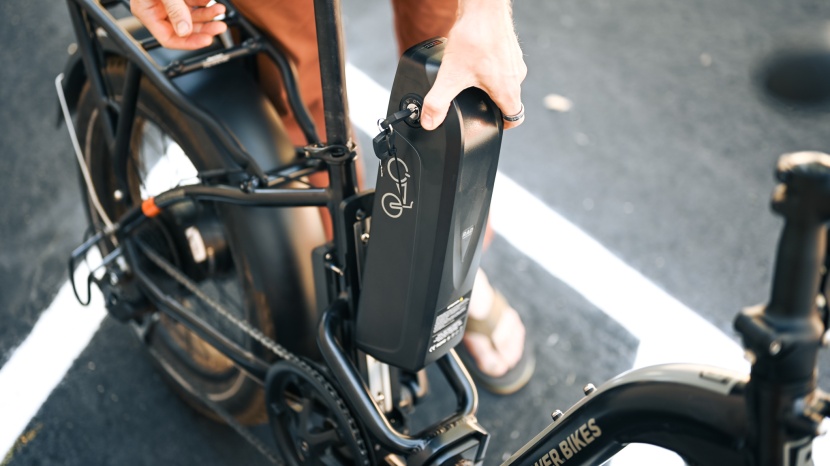 rad power radexpand 5 - unlock the battery and pull it upward to remove it from the seat...