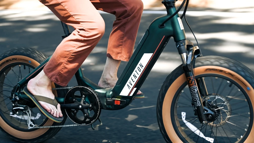 folding electric bike - wide tires, front suspension, and slick looks of the aventon make it...