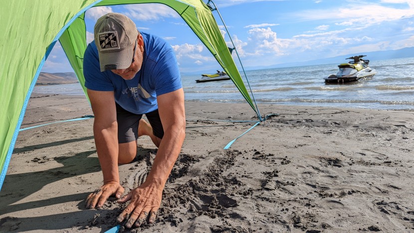 in addition to filling the built-in sand bags, we also buried the...