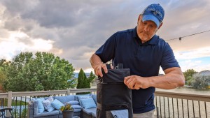 The first step for setup is unzipping the roller bag to expose the...