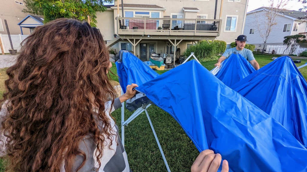 canopy tent - two people can set up the e-z up with ease. simply grab a leg and...