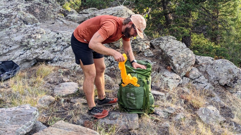 osprey atmos 65 ag - an outside mesh pocket makes stashing a jacket where you can grab it...