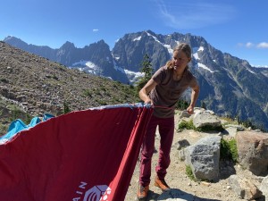 Karen Bockel sets up the Mountain Hardwear AC 2 tent. While sleeves...