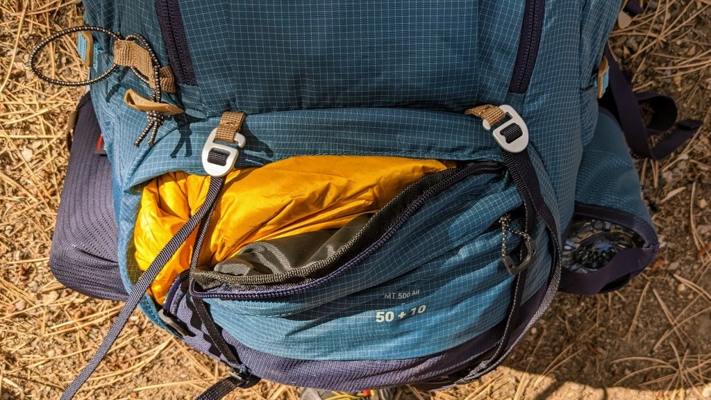 decathlon forclaz mt500 air 50+10 budget backpacking pack review - the sleeping bag compartment unzips to provide quick access to your...