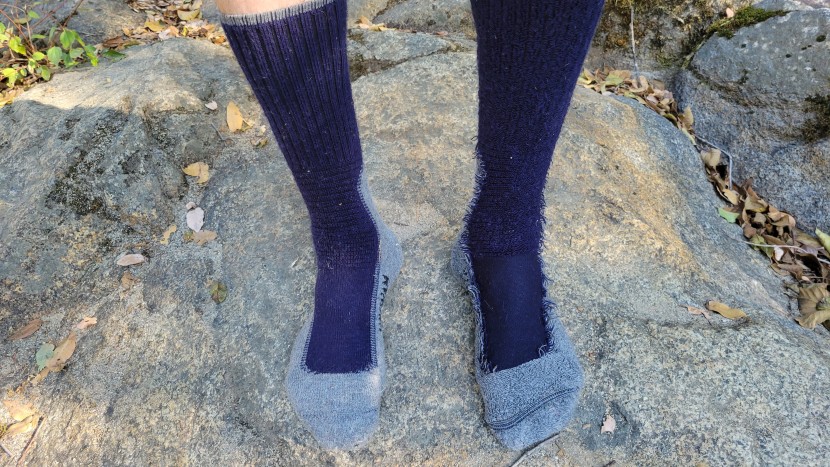 socks - midweight socks have more padding and are slightly thicker, i.e...